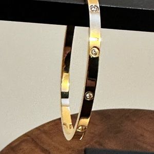 Gold bangle costume jewelry bracelet